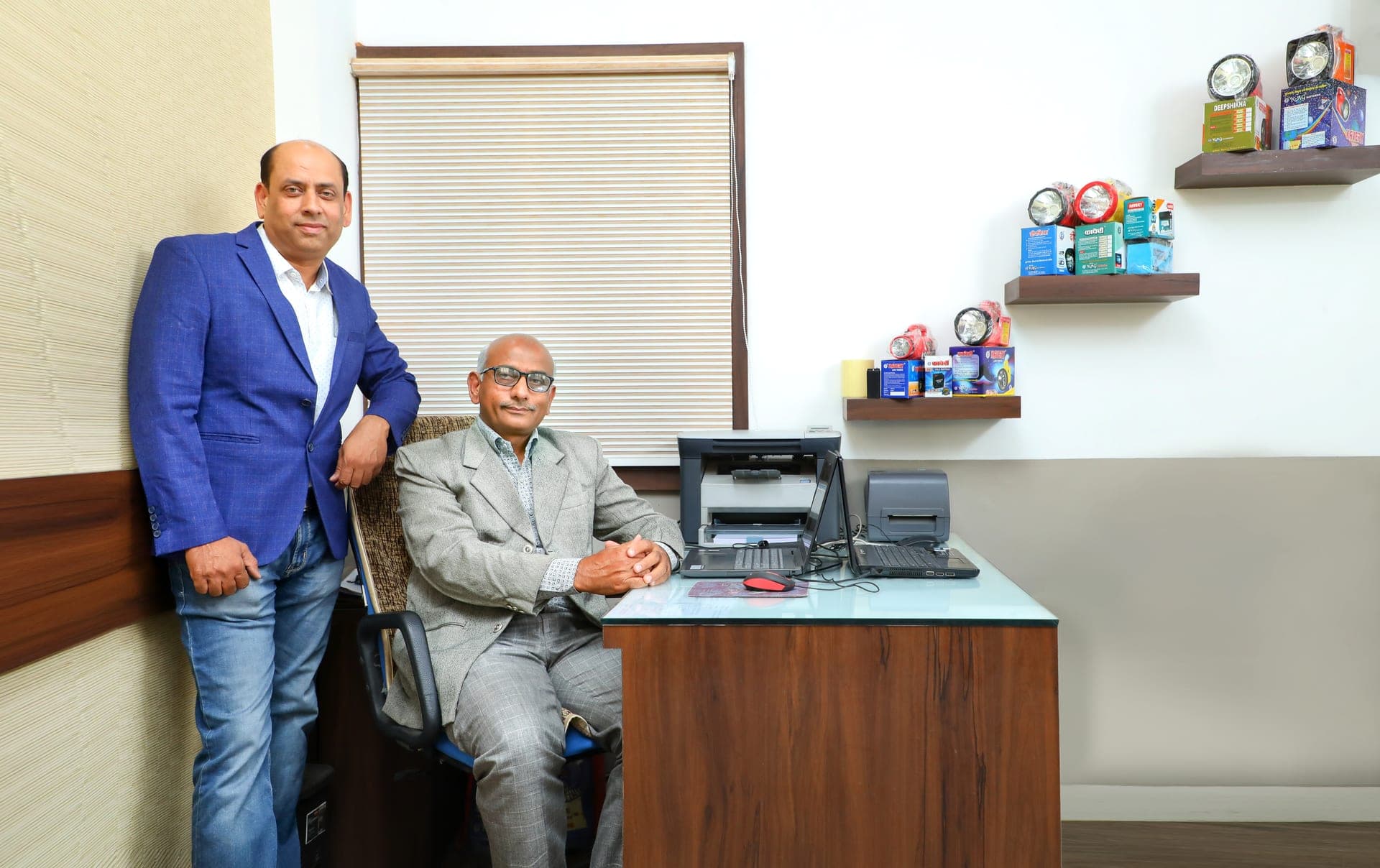 The two founders of KAG Batteries together at the company office